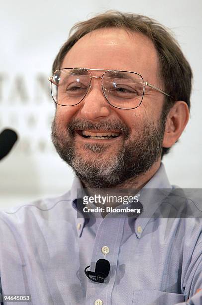 Andrew Fire of the Stanford University School of Medicine smiles during a news conference at the school in Palo Alto, California Monday, October 2,...
