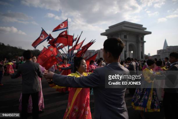 Students take part in a mass dance event during celebrations marking the anniversary of the birth of late North Korean leader Kim Il Sung in...