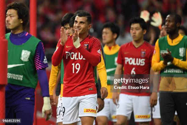 Andrew Nabbout of Urawa Red Diamonds applauds the fans after the J.League J1 match between Urawa Red Diamonds and Shimizu S-Pulse at Saitama Stadium...