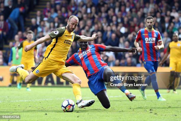 Glenn Murray of Brighton & Hove Albion is tackled by Mamadou Sakho of Crystal Palace during the Premier League match between Crystal Palace and...