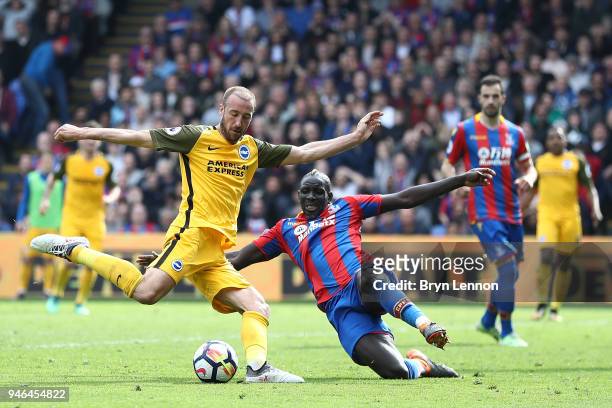 Glenn Murray of Brighton & Hove Albion is tackled by Mamadou Sakho of Crystal Palace during the Premier League match between Crystal Palace and...