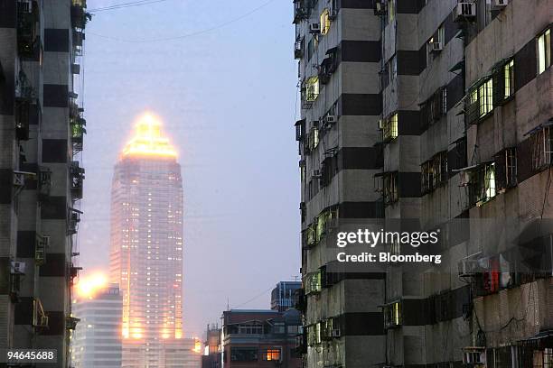 Residential buildings stand in Taipei, Taiwan, on Monday, April 16, 2007. China's missiles may not be the biggest danger to Taiwan. An impending...