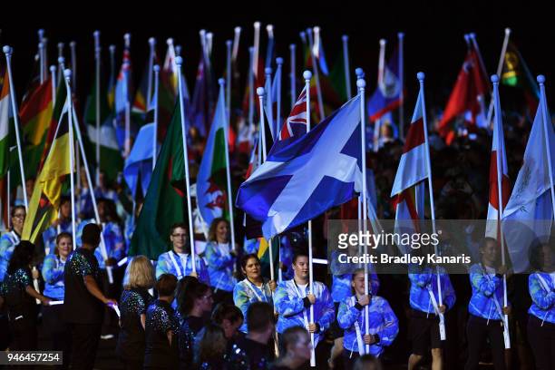 Athletes carry thier nations flags during the Closing Ceremony for the Gold Coast 2018 Commonwealth Games at Carrara Stadium on April 15, 2018 on the...