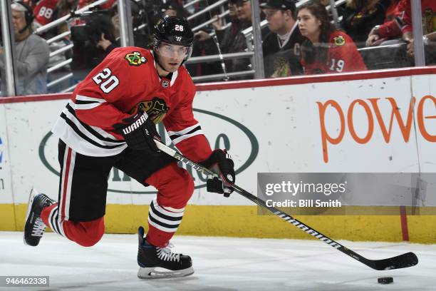 Brandon Saad of the Chicago Blackhawks approaches the puck in the third period against the St. Louis Blues at the United Center on April 6, 2018 in...