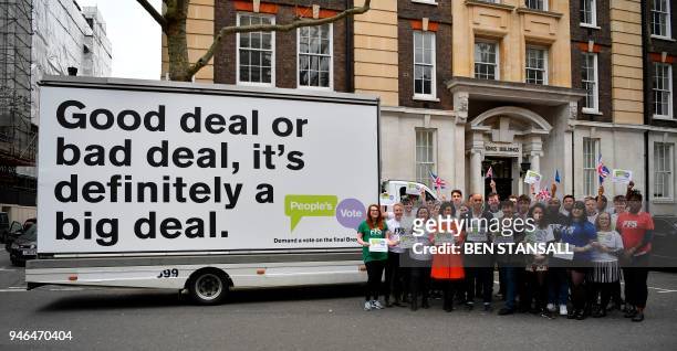 British politicians, Labour Party MP Chuka Umunna , Liberal Democrat MP Layla Moran and Green MP Caroline Lucas pose with activists in front of an...