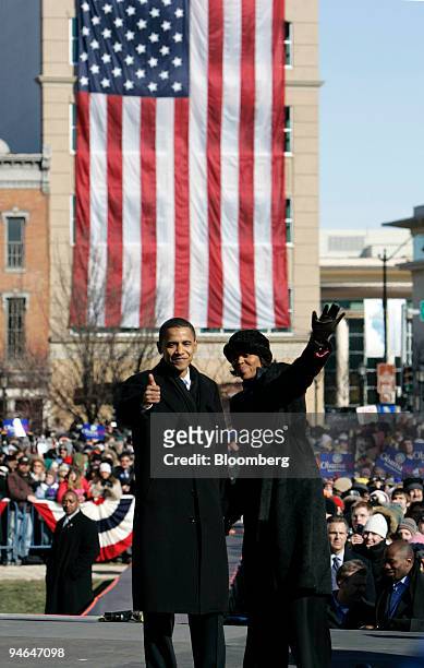 Illinois senator Barack Obama gives a thumbs up to the crowd with his wife Michelle after announcing his candidacy for the 2008 Presidential...