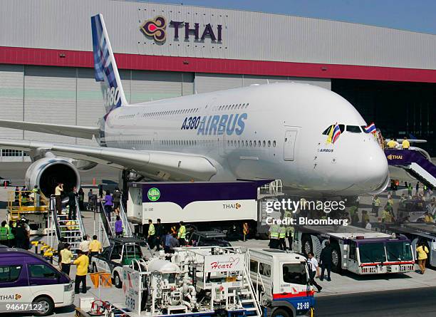 The Airbus A380, the world's largest commercial airliner, stands parked in front of the Thai Airways hangar at Bangkok's new Suvarnabhumi airport...