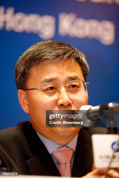 Guo Shuqing, chairman of China Construction Bank Corp., speaks at a news conference, on Monday, April 16 in Hong Kong, China. China Construction Bank...