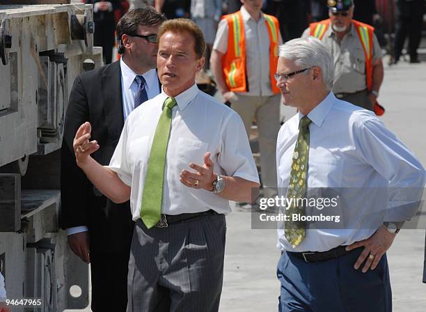 British Columbia Premier Gordon Campbell and California Governor Arnold Schwarzenegger tour a P3, public private partnership, development on the...