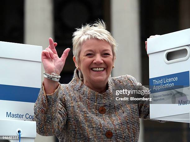 Dianne Thompsom, chief executive of Camelot submitting her bid to The National Lottery outside The National Gallery in London, Friday, February 9,...