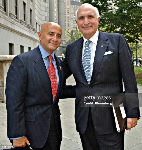 Richard Grasso, former chief executive officer of The New York Stock Exchange, left, poses with Kenneth Langone following a court hearing in New York...