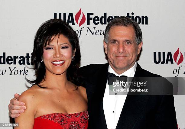 Leslie Moonves, right, president and chief executive officer of CBS Corp., and his wife Julie Chen, pose at an event where Richard D. Parsons,...