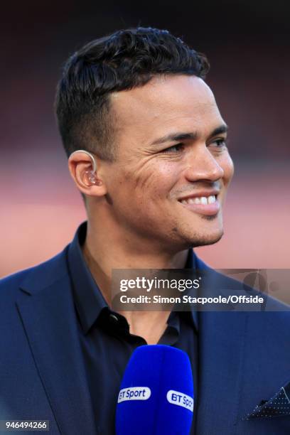 Pitchside pundit Jermaine Jenas looks on during the Premier League match between Liverpool and AFC Bournemouth at Anfield on April 14, 2018 in...