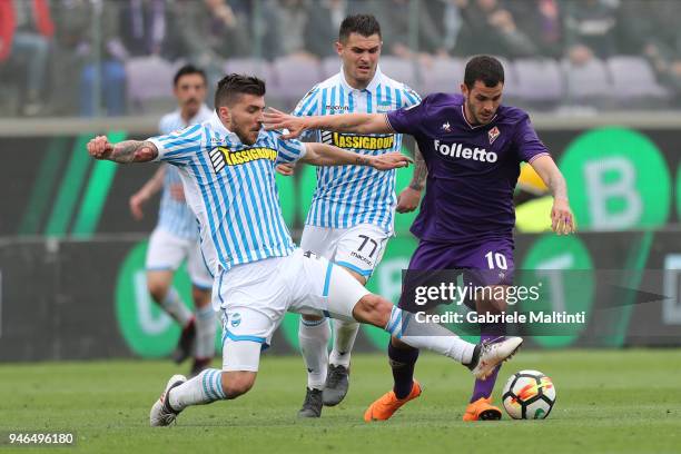 Valentin Eysseric of ACF Fiorentina battles for the ball with Alberto Paloschi of Spal during the serie A match between ACF Fiorentina and Spal at...