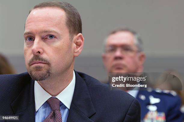 Dr. John F. Hillen, Assistant Secretary of State for Political Military Affairs, foreground, and Airforce Lt. Gen. Jeff Kohler of the Defense...