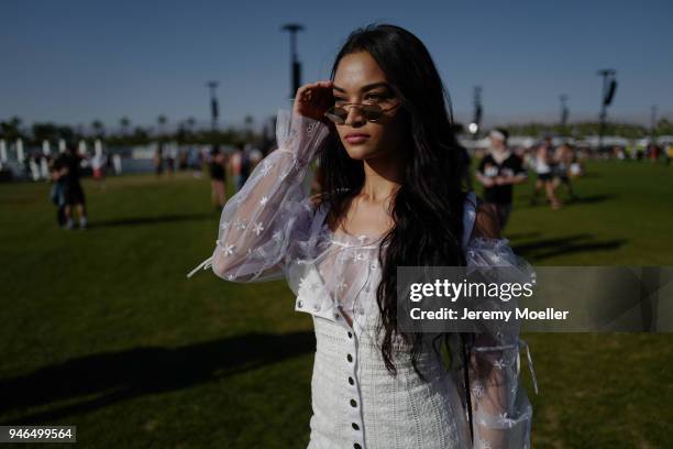 Coachella guest wearing a sheer dress and white Doc Martens during day 1 of the 2018 Coachella Valley Music & Arts Festival Weekend 1 on April 13,...