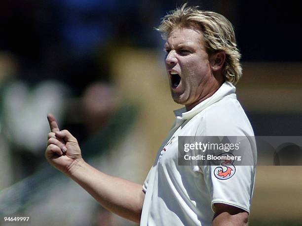 Shane Warne, bowling for Australia, celebrates after claiming the wicket of England batsman Kevin Pietersen on day 5 of the second Ashes Test match...