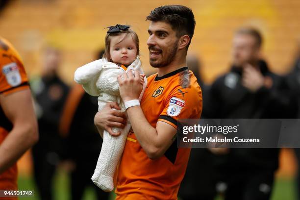 Ruben Neves of Wolverhampton Wanderers with his daughter Margarida following he Sky Bet Championship match between Wolverhampton Wanderers and...