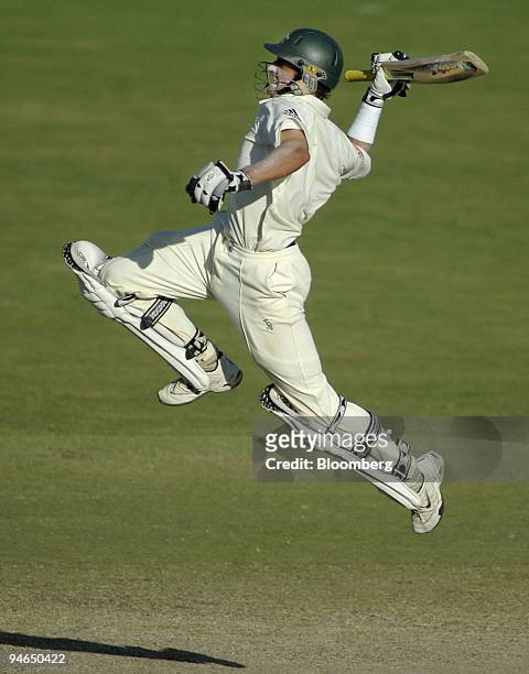 Michael Hussey, batting for Australia, leaps into the air after hitting the winning runs to give Australia victory over England by 6 wickets on day 5...