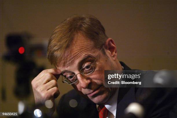 James Cicconi, senior executive vice president of External & Legislative Affairs for AT&T listens to a question at a news conference held by the...