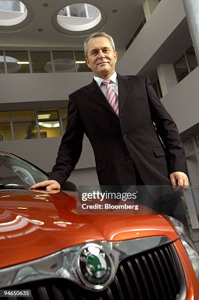 Reinhard Jung, chief executive officer of Skoda Auto, poses by a Skoda Fabia car in Mlada Boleslav, Czech Republic, on Wednesday, Dec. 5 2007. Jung,...