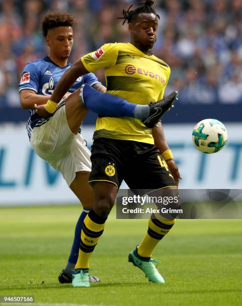 Thilo Kehrer of Schalke and Michy Batshuayi of Dortmund battle for the ball during the Bundesliga match between FC Schalke 04 and Borussia Dortmund...