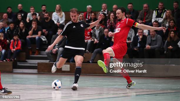 Michael Meyer of Hamburg and Christopher Wittig of Hohenstein Ernstthal compete for the ball during the semi final German Futsal Championship match...