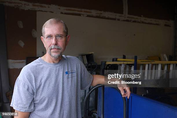 Jeffrey Lockler pauses at his son?s warehouse in Tampa, Florida while preparing for a job on Tuesday, July 18, 2006. 53-year-old, Lockler was...