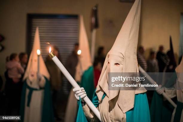 penance processions in spain, celebrating holy week (semana santa) in the the town of sóller in west mallorca / majorca - pollensa stock pictures, royalty-free photos & images