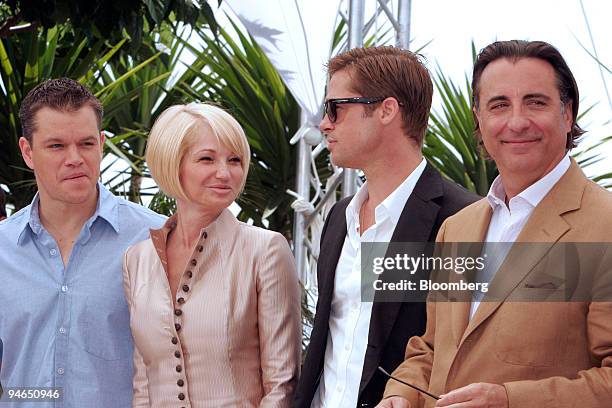 Actors, from left, Matt Damon, Ellen Barkin, Brad Pitt and Andy Garcia, part of the cast of "Ocean's 13," pose during the premiere of the movie at...