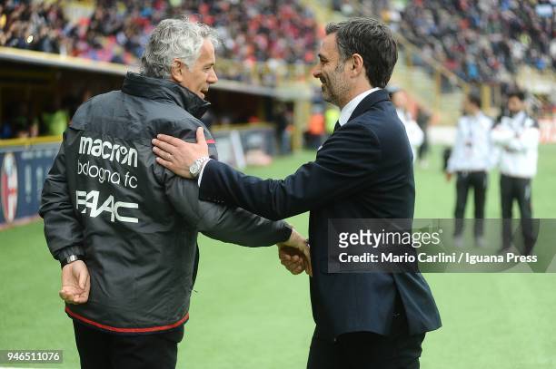 Roberto Donadoni, head coach of Bologna FC shakes hand with Franco Pecchia, head coach of Hellas Verona FC during the serie A match between Bologna...