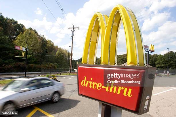 Car enters the drive-thru line at a Framingham, Massachusetts McDonald's restaurant Wednesday, September 27, 2006. McDonald's Corp. Faces renewed...