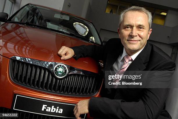 Reinhard Jung, chief executive officer of Skoda Auto, poses by a Skoda Fabia car in Mlada Boleslav, Czech Republic, on Wednesday, Dec. 5 2007. Jung,...