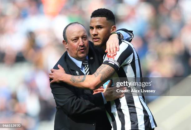 Rafael Benitez, Manager of Newcastle United and Jamaal Lascelles of Newcastle United hug each other after the Premier League match between Newcastle...