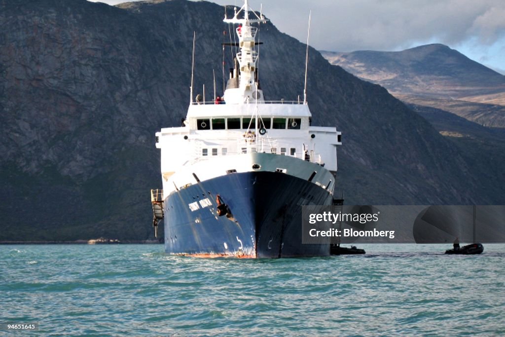 The expedition cruise ship Lyubov Orlova is anchored in Pang