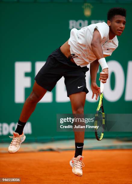 Felix Auger-Aliassime of Canada serves during the Round of 64 match between Mischa Zverev and Felix Auger-Aliassime during Day One of ATP Masters...