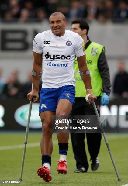 Jonathan Joseph of Bath goes off injured during the Aviva Premiership match between Saracens and Bath Rugby at Allianz Park on April 15, 2018 in...