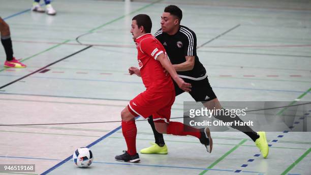 Ian Prescott Claus of Hamburg and Durim Elezi of Hohenstein Ernstthal compete for the ball during the semi final German Futsal Championship match...