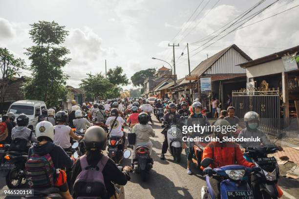traffic jam in bali - indonesia bikes traffic stock pictures, royalty-free photos & images