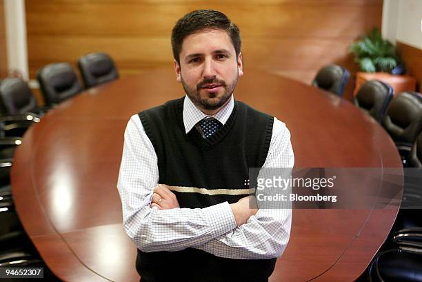 Henry Neira Silva, BanChile de Fondos portfolio manager, poses in his office in Santiago, Chile, Monday, July 17, 2006.