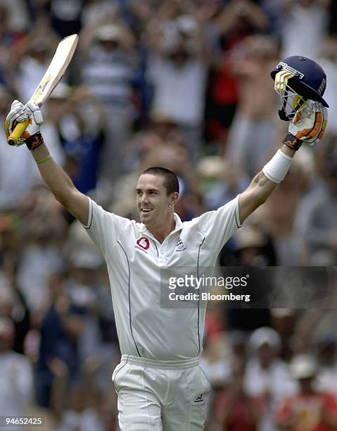 Kevin Pietersen, batting for England, celebrates reaching 100 runs on day 2 of the second Ashes Test match at the Adelaide Oval in Adelaide,...
