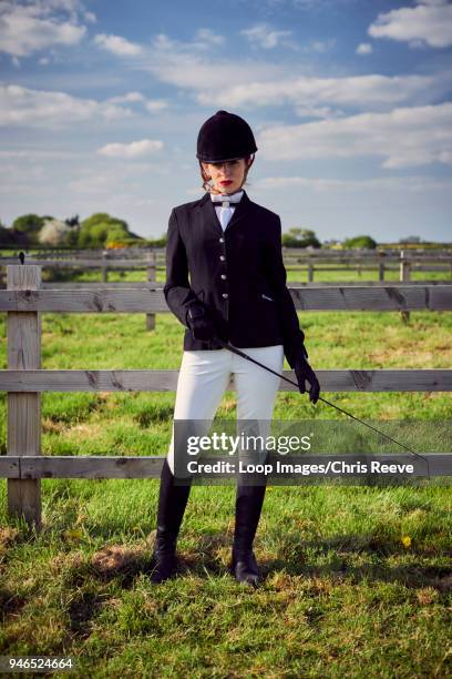 women in equestrian clothing looking at camera - riding habit stock pictures, royalty-free photos & images