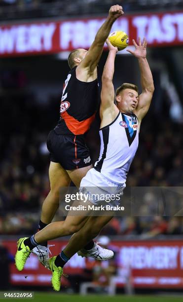 Tom Bellchambers of the Bombers spoils Ollie Wines of Port Adelaide during the round four AFL match between the Essendon Bombers and the Port...