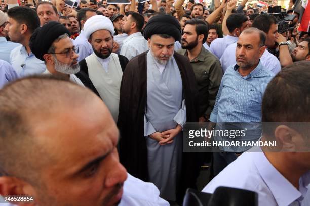 Shiite cleric Moqtada al-Sadr attends the demonstration against the western bombings of Syria, which he called for, on april 15 in Najaf. US, French...