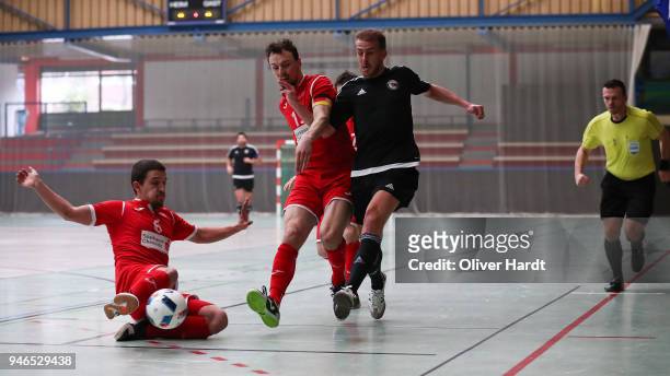 Stefan Winkel of Hamburg and Christopher Wittig of Hohenstein Ernstthal compete for the ball during the semi final German Futsal Championship match...