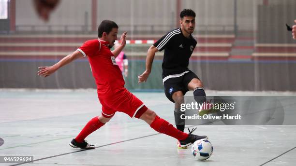 Mohamed Labiadh of Hamburg and Durim Elezi of Hohenstein Ernstthal compete for the ball during the semi final German Futsal Championship match...