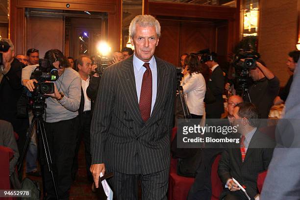 Marco Tronchetti Provera, chairman of Pirelli and former head of Telecom Italia leaves a news conference in Milan, Italy, Monday, September 25, 2006....