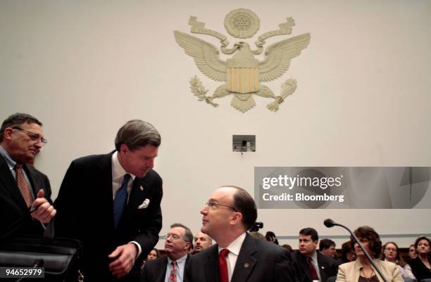 David Oliver, former Advisor, Iraq Ministry of Finance, left; L. Paul Bremer, Former Head, Coalition Provisional Authority, center; and Stuart Bowen...