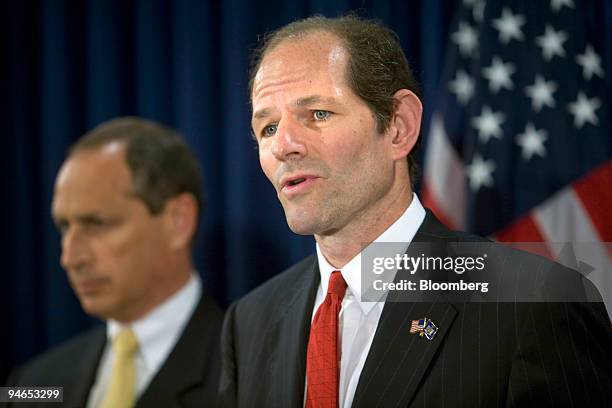 New York Governor Eliot Spitzer speaks at a news briefing on the condition of New York State's bridges, as Elliot Sander, executive director of New...