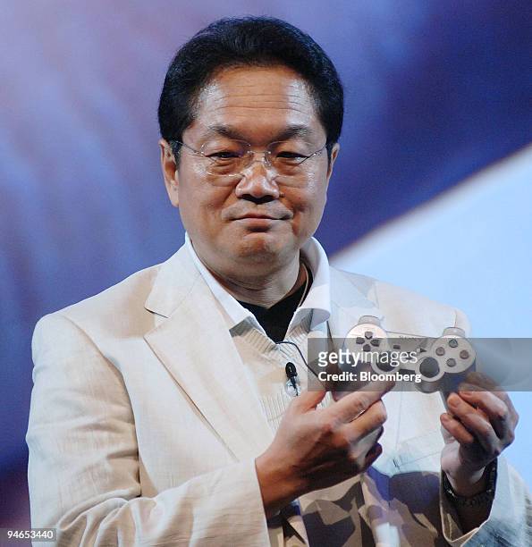Ken Kutaragi, president and group chief executive officer for Sony Computer Entertainment Inc., shows the new controller for PlayStation 3 gaming...